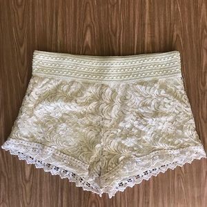 Cream colored lace elastic waist shorts